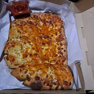 cheese pizza in a pizza box