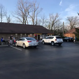 several cars parked in a parking lot