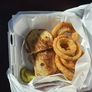 Reuben sandwich and onion rings