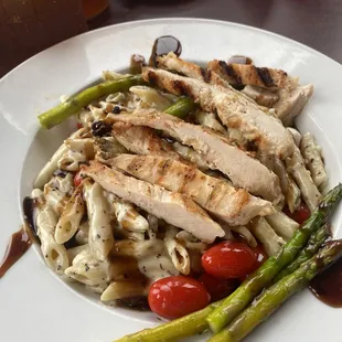 A very cold penne pasta with cold chicken lol the balsamic sauce is very sweet but definitely yummy.