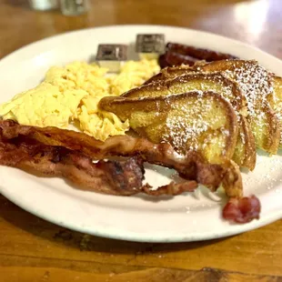 French toast with bacon, sausage and eggs.
