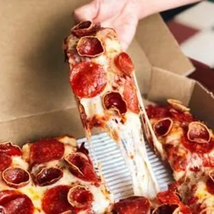 a slice of pepperoni pizza