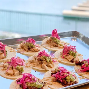 Shrimp, chicken, and smoked brisket tacos.  Served on our tortillas made on-site
