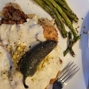 Pistachio Fried Steak topped with a wonderfully charred jalapeño and fried asparagus