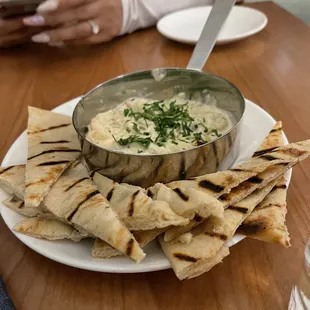 The seafood and artichoke dip and Naan