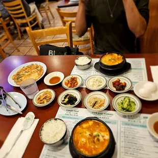 Dinner! Combo tofu soup (bottom) dumpling tofu soup (top)