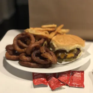 Plated at home--Massive basket of fries/onion rings and original cheese burger--all was excellent!