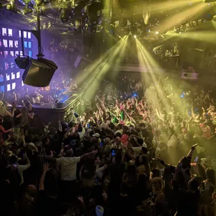 a large crowd of people at a nightclub