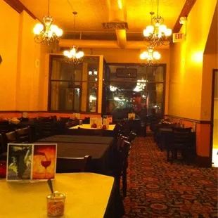 a dining room with chandeliers