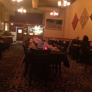 a dining room with tables and chairs