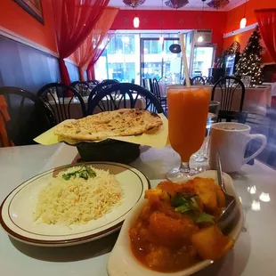 Aloo gohbi, basmati rice,  garlic Naan, mango Lassi.