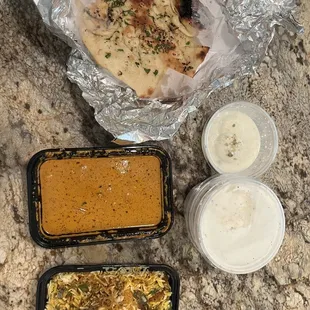 Garlic naan, chicken tikka masala (which comes with rice), chicken biriyani (which comes with raita) and rasamalai.