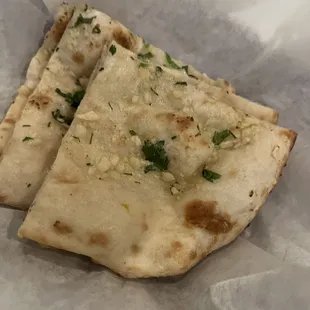 Garlic Naan- there is literally garlic toppings so you must really enjoy garlic.  I loved it!