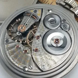 We repair wrist and pocket watches- like this lovely railroad grade Elgin Veritas movement.