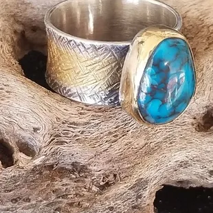 Bisbee high grade turquoise in silver and 22 it gold.