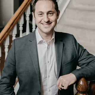 Marc E.
