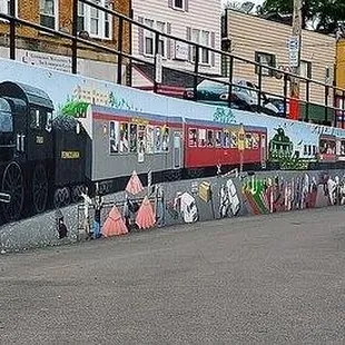 a mural of a train