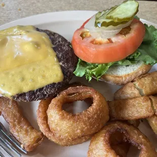 American cheese hamburger with onion rings