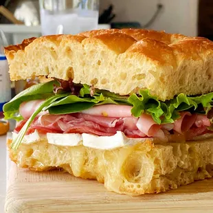 a sandwich on a cutting board