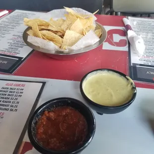 Chips and salsa. Green has some kick to it.