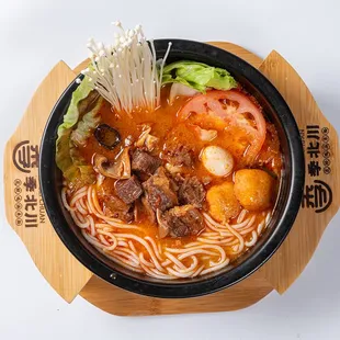 an overhead view of a bowl of food