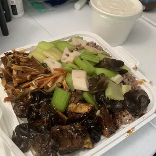 Pig Ear Salad, Celery with Lotus Root Salad, Sweet and Sour Pork Ribs over Brown Rice