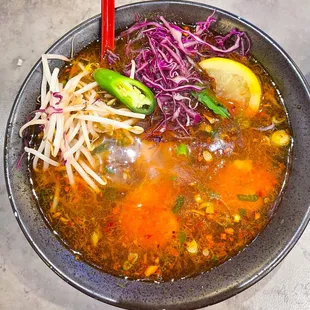 Spicy shrimp soup with flat rice noodles