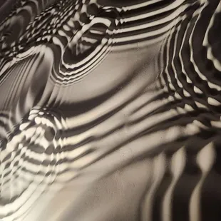 Uplifting on raindrop textured wall