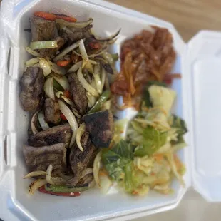 Grilled Lamb with cabbage and grilled onions