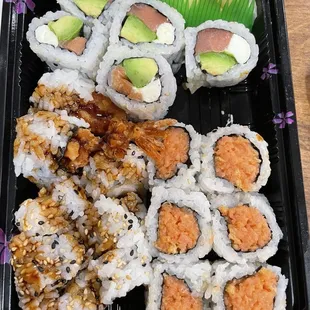 Philadelphia roll, spicy tuna roll and Shrimp Tempura Roll