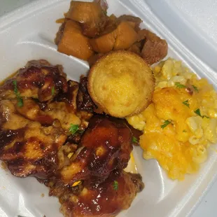 Honey glazed jerk bbq wings w/ bake mac, candied yams, Sweet honey cornbread.