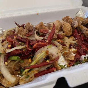 a take out container of food