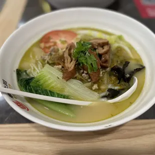 Rice noodles in pickled mustard soup with hog fat end