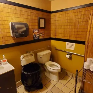 a bathroom with a toilet and sink