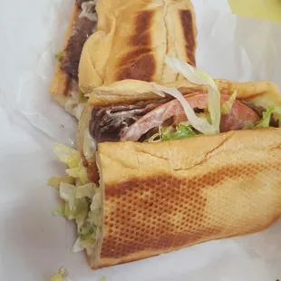 Steak and cheese...lettuce, tomatoe, mayo and provolone cheese