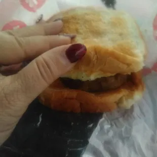 Breakfast toaster with sausage, egg and cheese