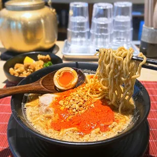 Vegan Miso Ramen ($15) w/ pork chashu, missing veggies, ajitama egg (+$2), extra nuts (+$1), spicy level #1 &amp; Chicken Karaage ($4.50)