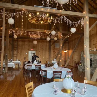a dining room with tables and chairs