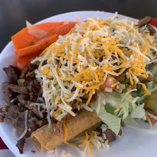 El Jefe rolled taquitos: 4 taquitos topped with carne asada, guacamole, lettuce, pico de gallo, guacamole, and cheese.