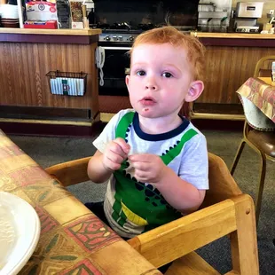 After one bite of pancake, he immediately signaled more.