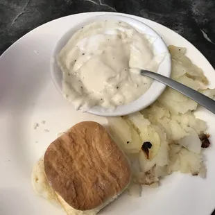 Other half of my breakfast. Biscuit gravy and potatoes.