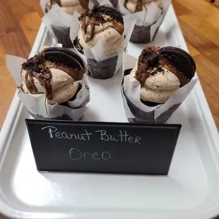 a tray of peanut butter oreo cupcakes