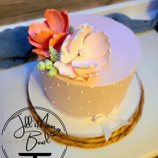 a cake with a flower on top