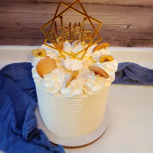 a cake with a happy birthday topper