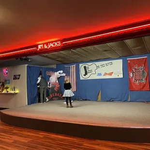 Stage next to our table, the kids had so much fun playing on it