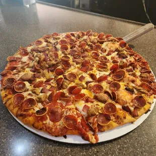 Large meat lovers pizza