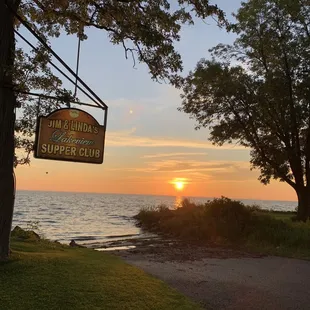 a sunset over the lake