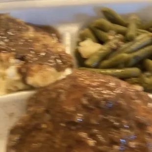 Smothered pork chops  just look at the seasoning in the gravy