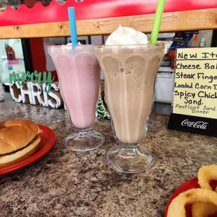 two milkshakes and a sandwich