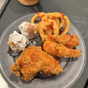 Three piece (2 legs and a thigh) plus some onion rings with Fritters!!